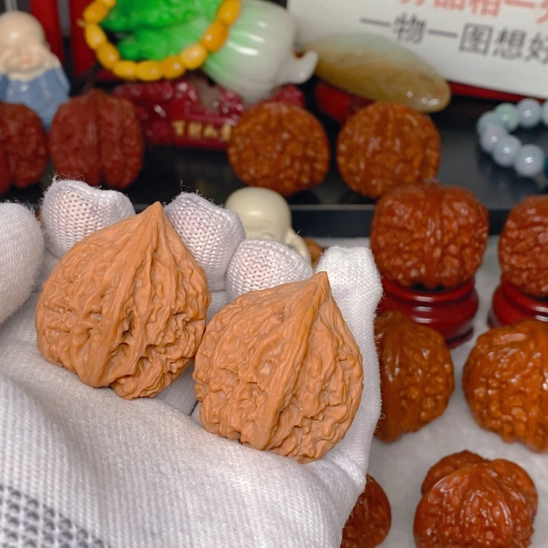 甲***寅文玩核桃吊坠老树鸡心