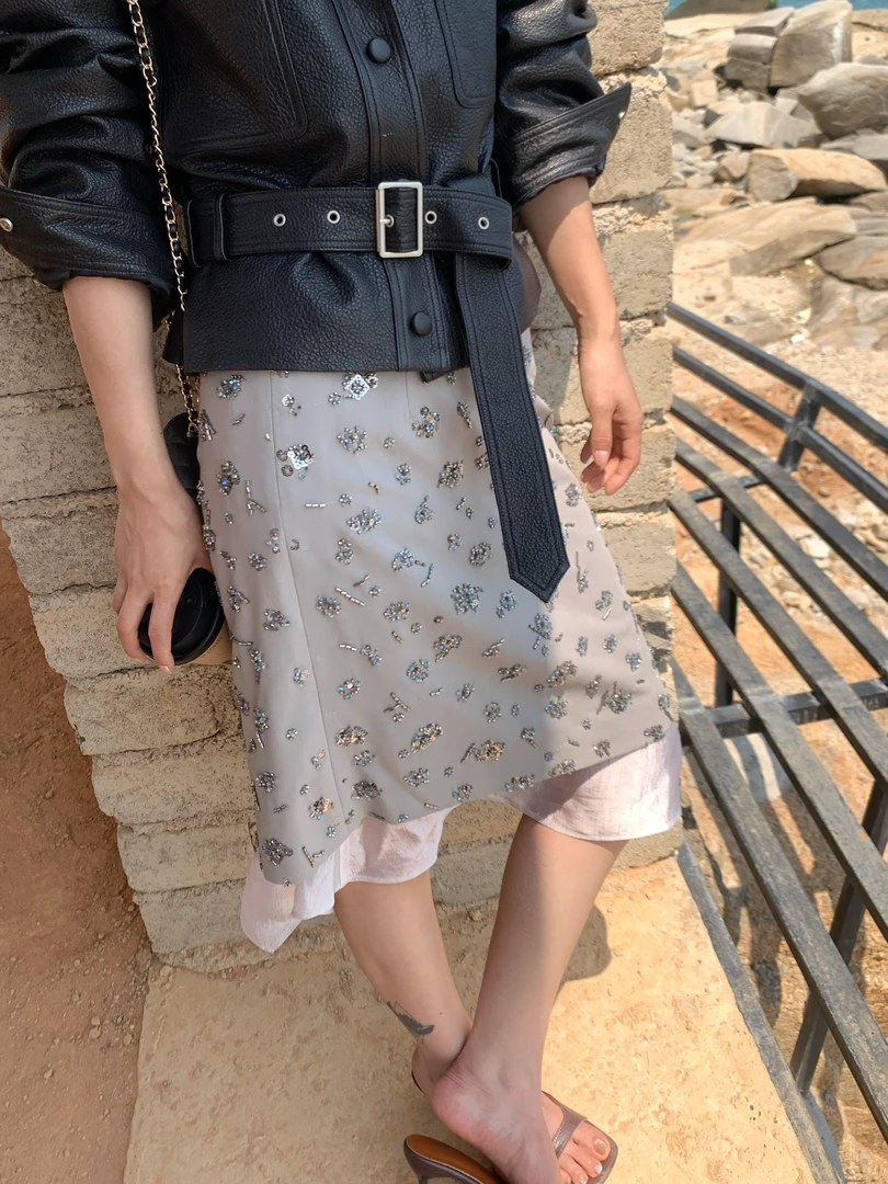 MAR 2025春夏新款重工手缝珠片工艺下摆不规则拼接半身裙女606089