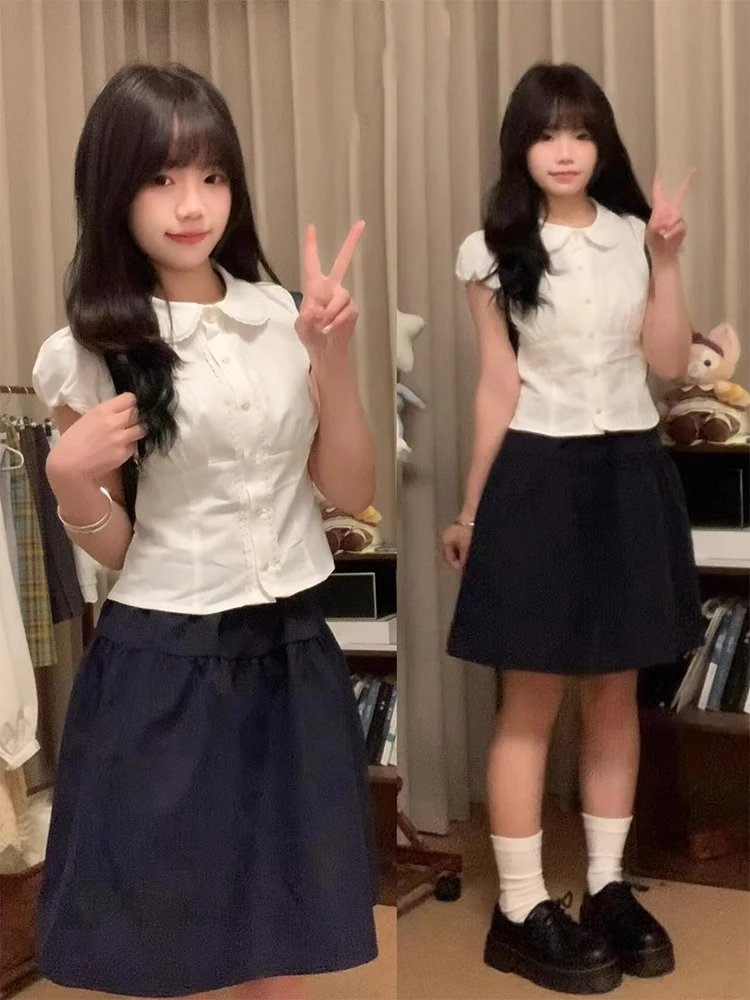 日系学院风短裙大码胖mm梨形身材夏季新款a字花苞裙藏蓝色半身裙