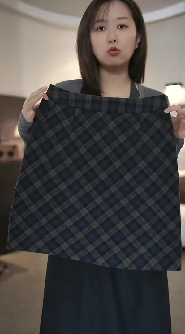 毛呢格子裙2025秋冬季新款高腰口袋中长裙复古轻奢百搭A字裙