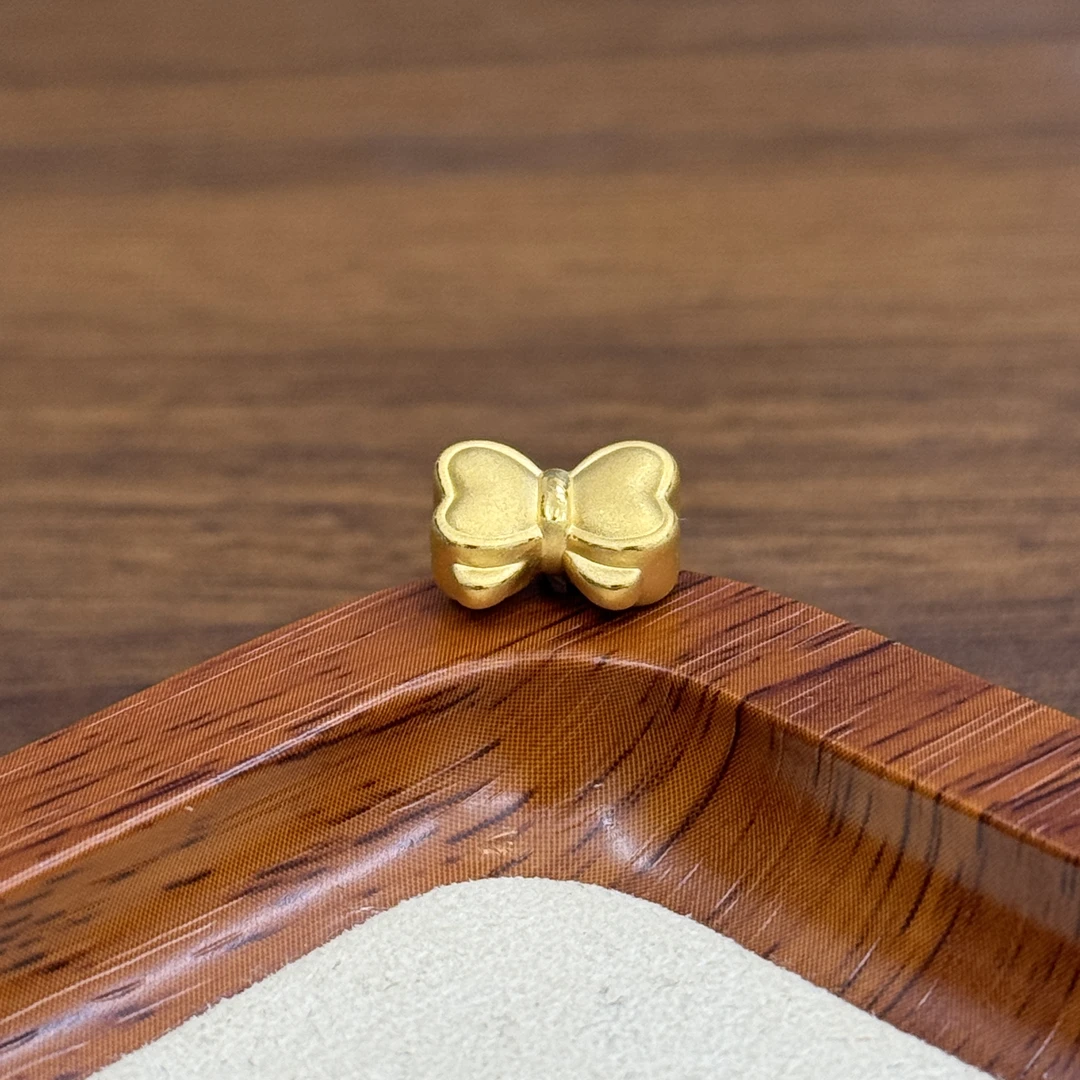 水贝黄金足金999甜梦蝴蝶结转运珠DP2096