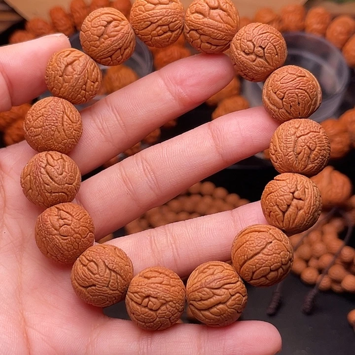 手串桃核金丝龙珠1.6