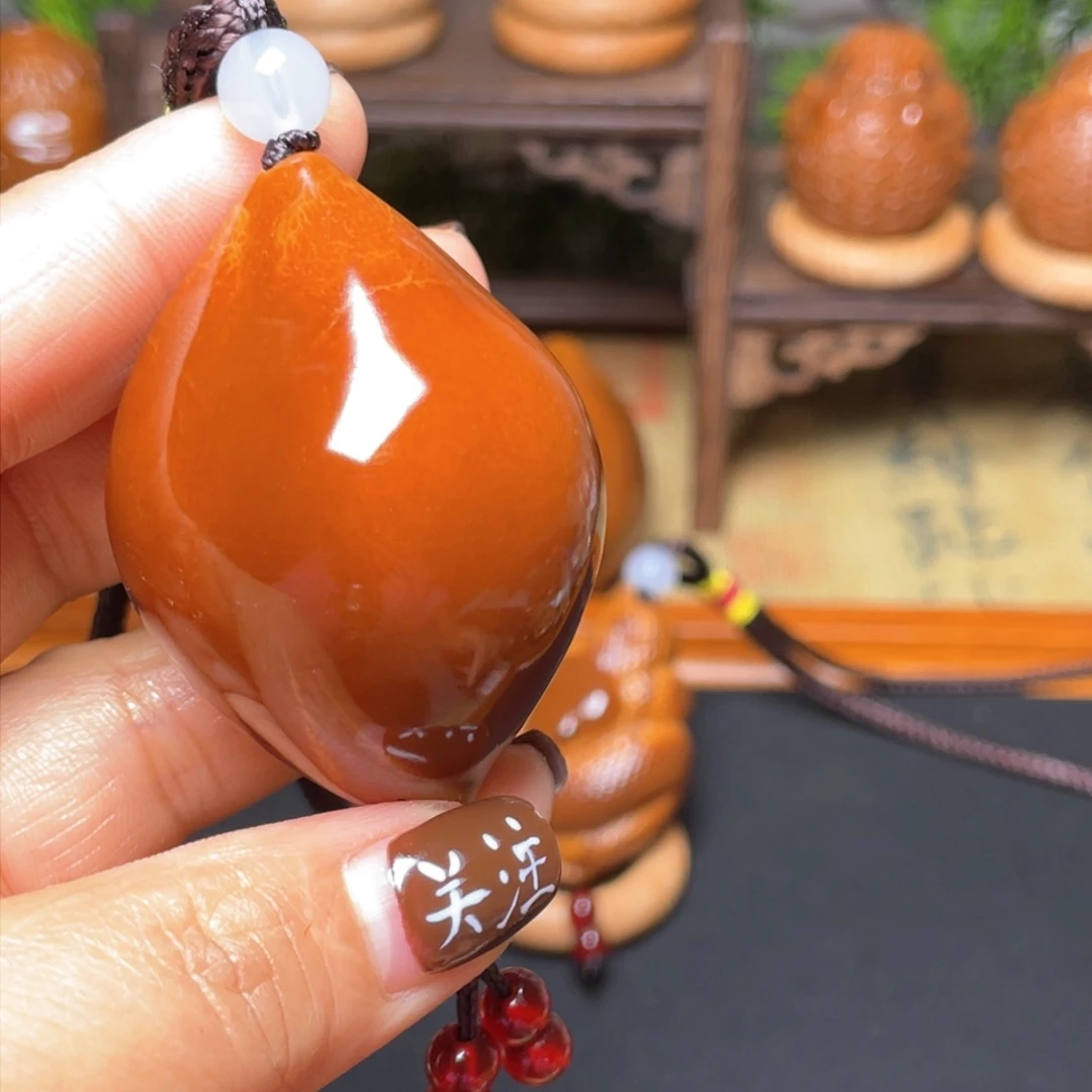 橄榄核吊坠鲍鱼37穿配