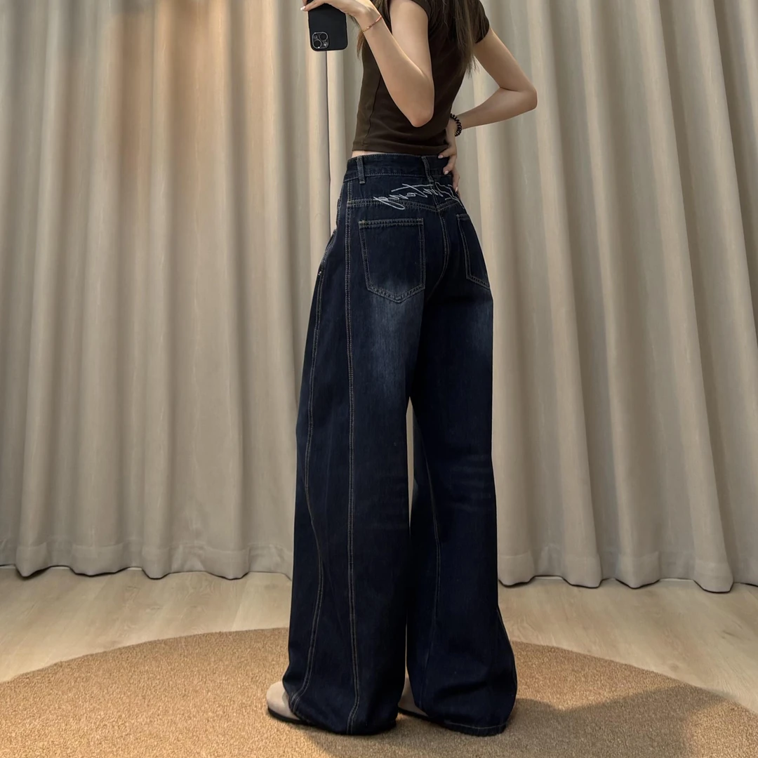 背后刺绣拼接设计感弯刀牛仔裤女秋季新款美式复古做旧宽松阔腿裤
