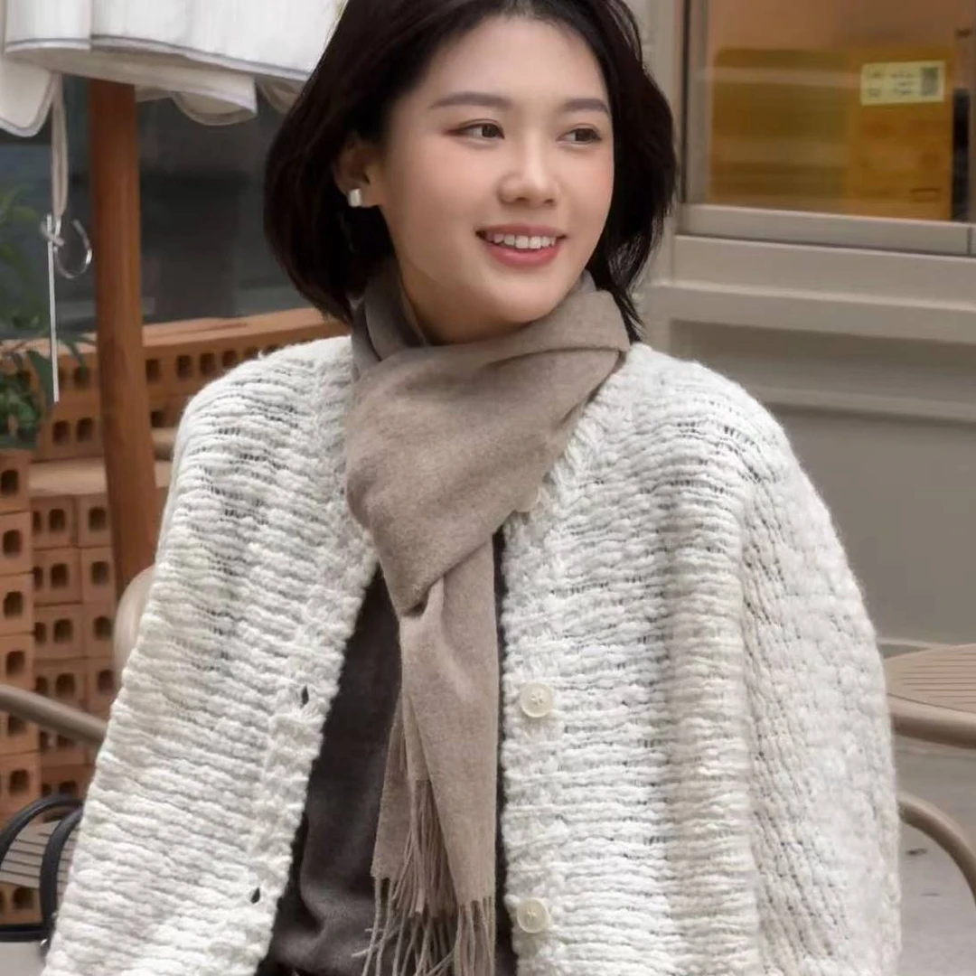 张妍LUNA 绵羊毛5针16支高克重镂空宽松慵懒风针织开衫YY26356