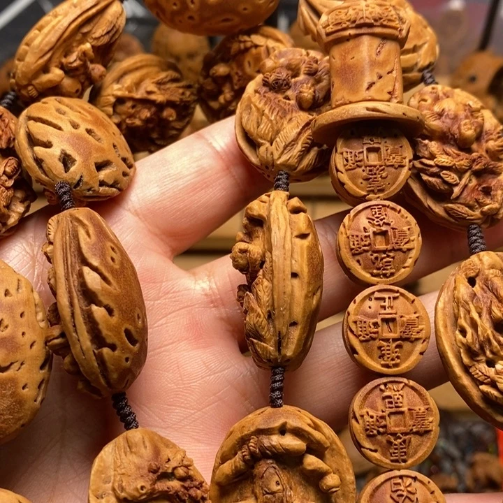 咦***华桃核手工雕刻十八罗汉➕金钱剑