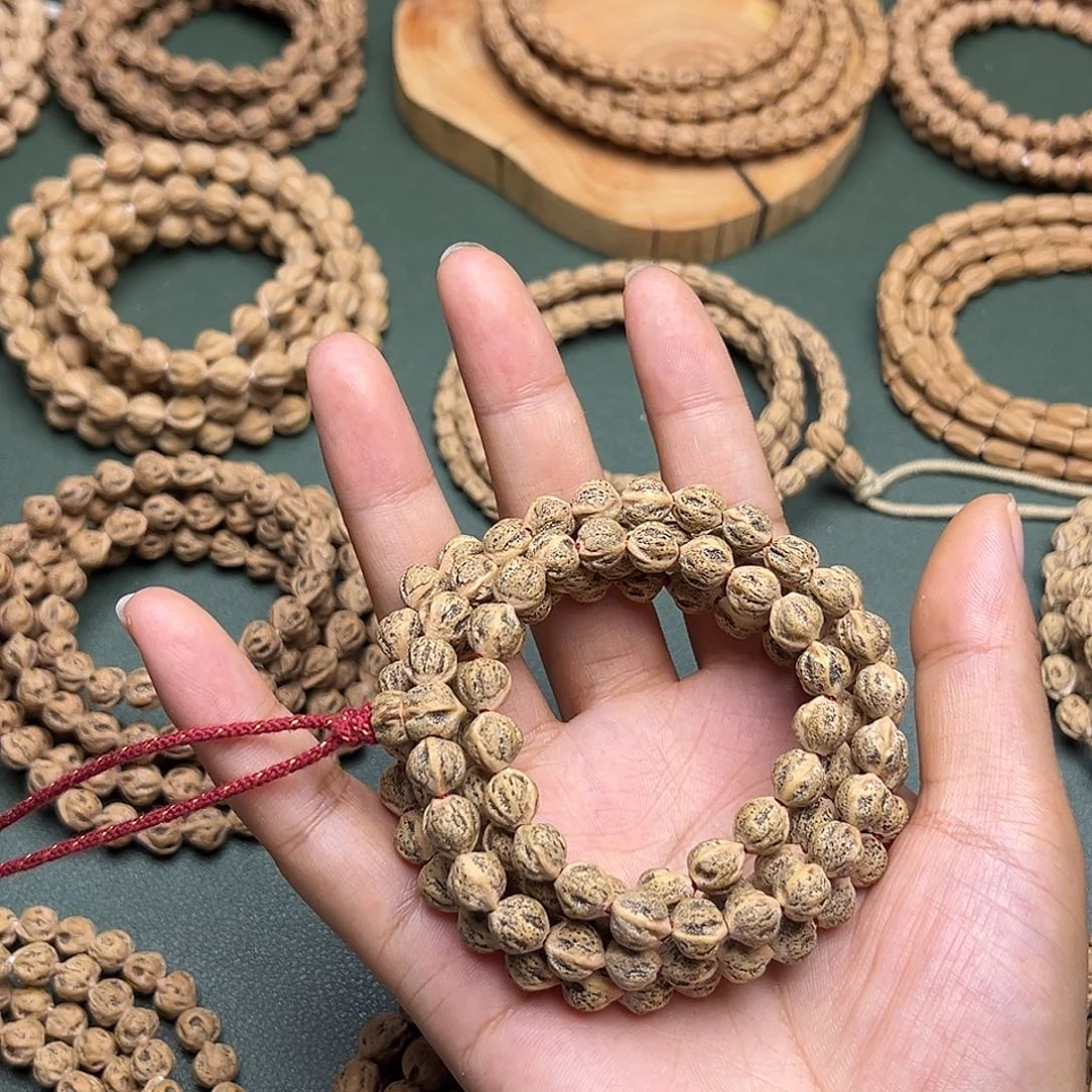 柏香籽/百香籽手串原装无修玉化皮雪花球