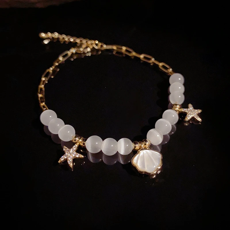 铜合金贝壳手链夏季新款 小清新通透简约贝壳海星猫眼石手链 时尚