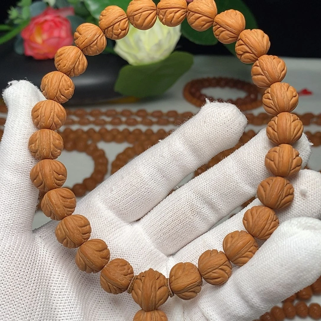 岁***蓓桃核手串野生树王水晶桃核手持25颗