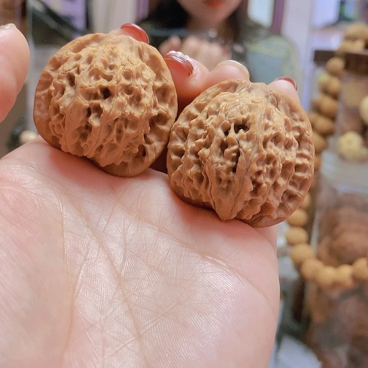 【闪购商品】文玩核桃把件37凤眼红皮