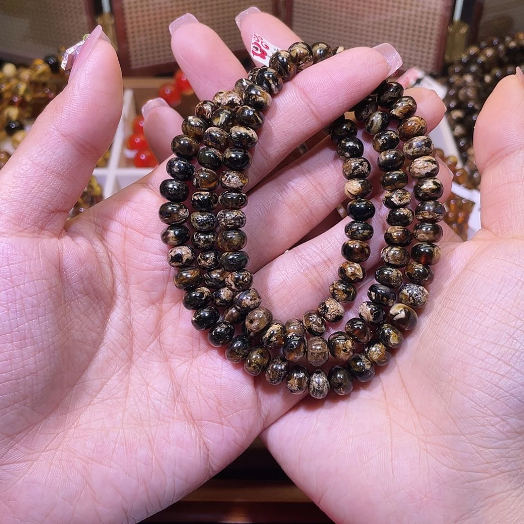 琥珀未镶嵌裸石抚顺琥珀7+熊猫花