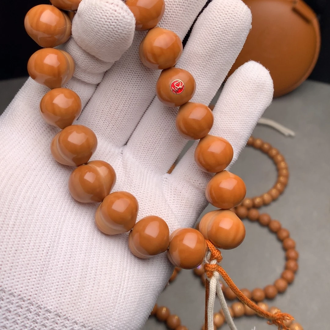 猴头核桃手串屁桃17尺寸镶嵌一个银标