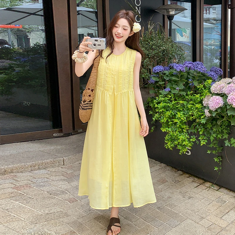 YIRAN/奕冉黄色后背镂空法式连衣裙女2025新款漂亮掐腰减龄度假裙