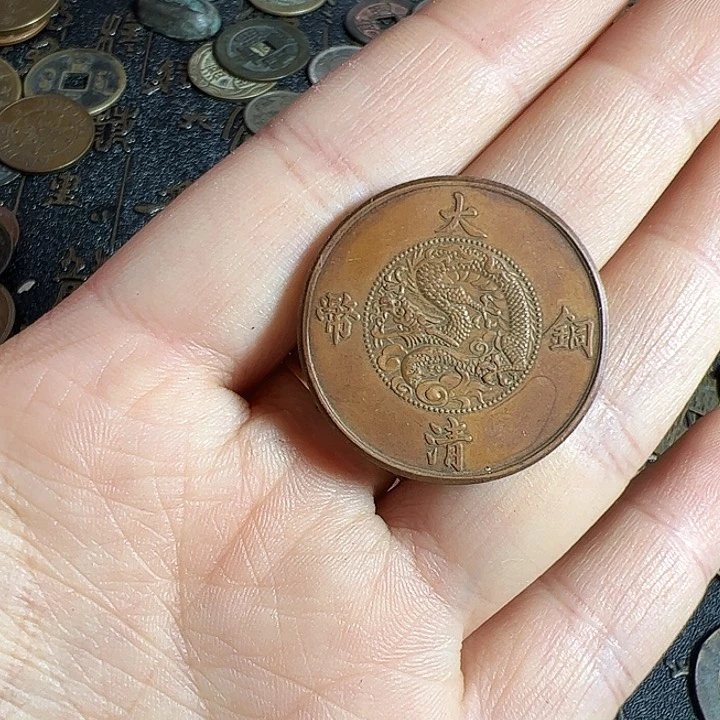 用***1一个铜币工艺品摆件