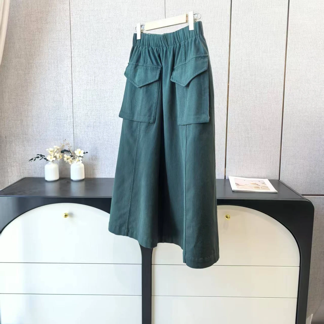 241067工装风双口袋线条绒半身裙