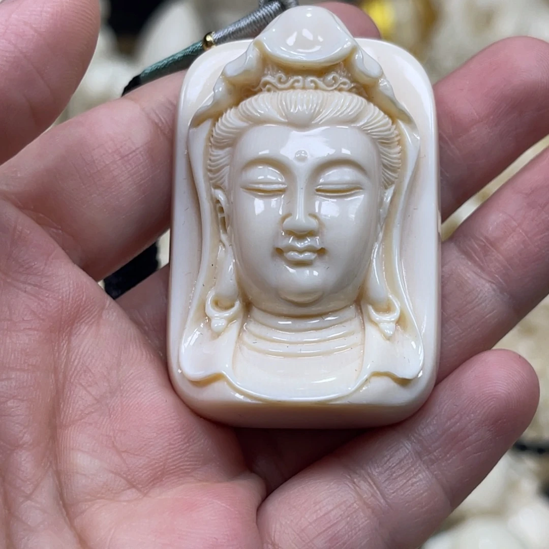 宇***舒猛犸象牙把件牌子