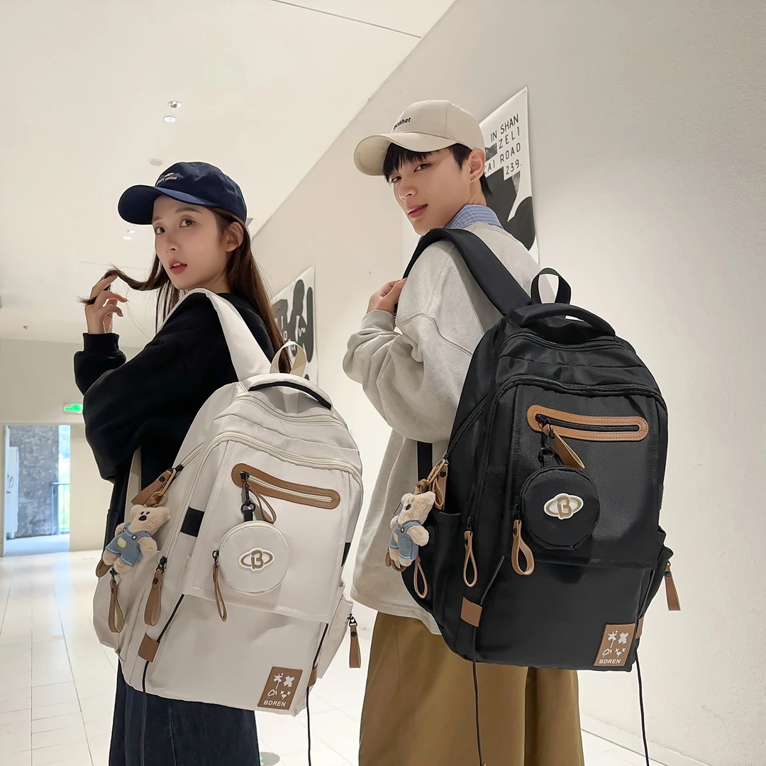 减负护脊书包男大容量学生电脑双肩包初中生大学生休闲旅行背包女