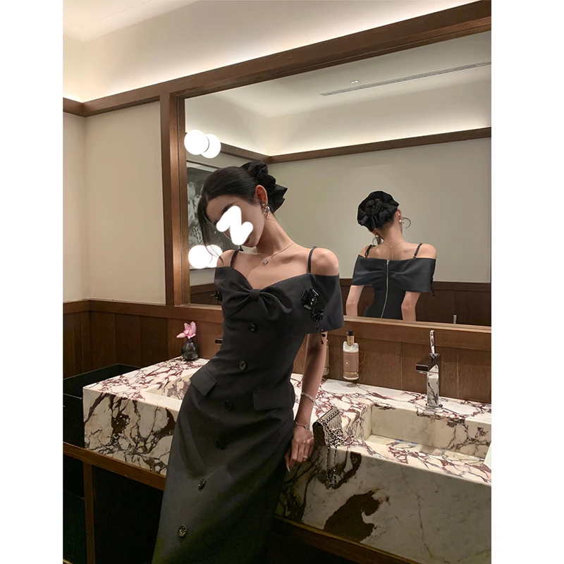 蝴蝶结一字肩立体花朵吊带连衣裙2025夏季新款女装时尚别致长裙潮