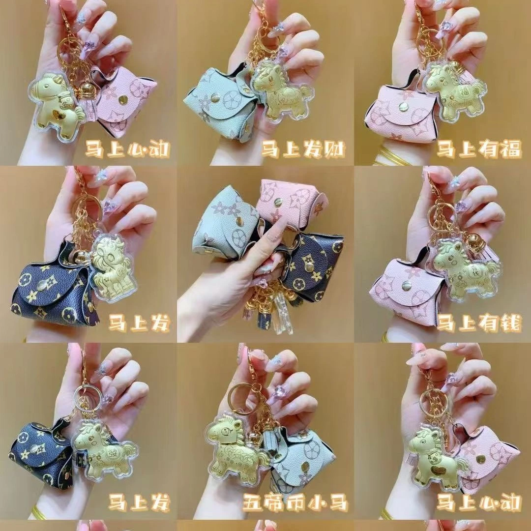 含金工艺品公主请发财皮革包钥匙扣飞马挂件手机链包包挂饰礼物