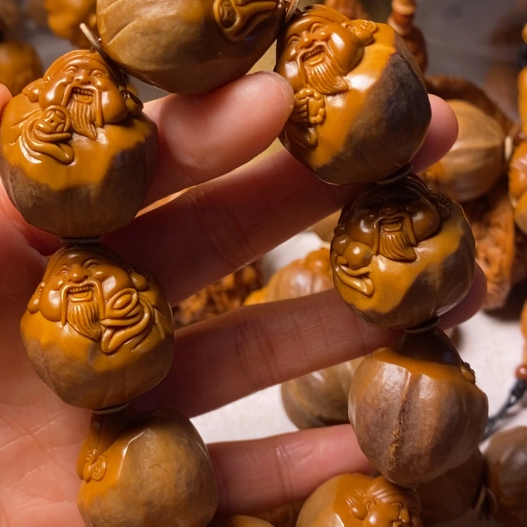 皮***手串/手链橄榄核包衣大财神精品