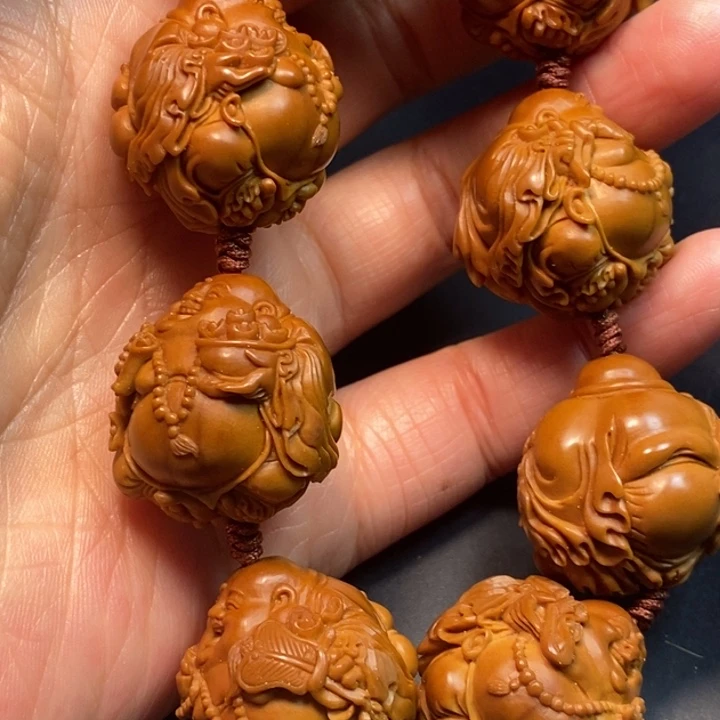 陈***墨橄榄核手串/手链弥勒手串