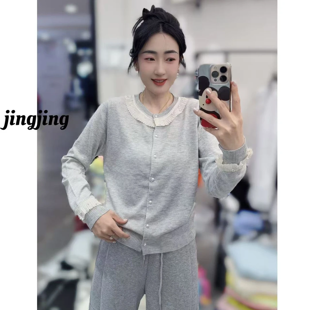 早春新款休闲百搭蕾丝边针织衫（0117）