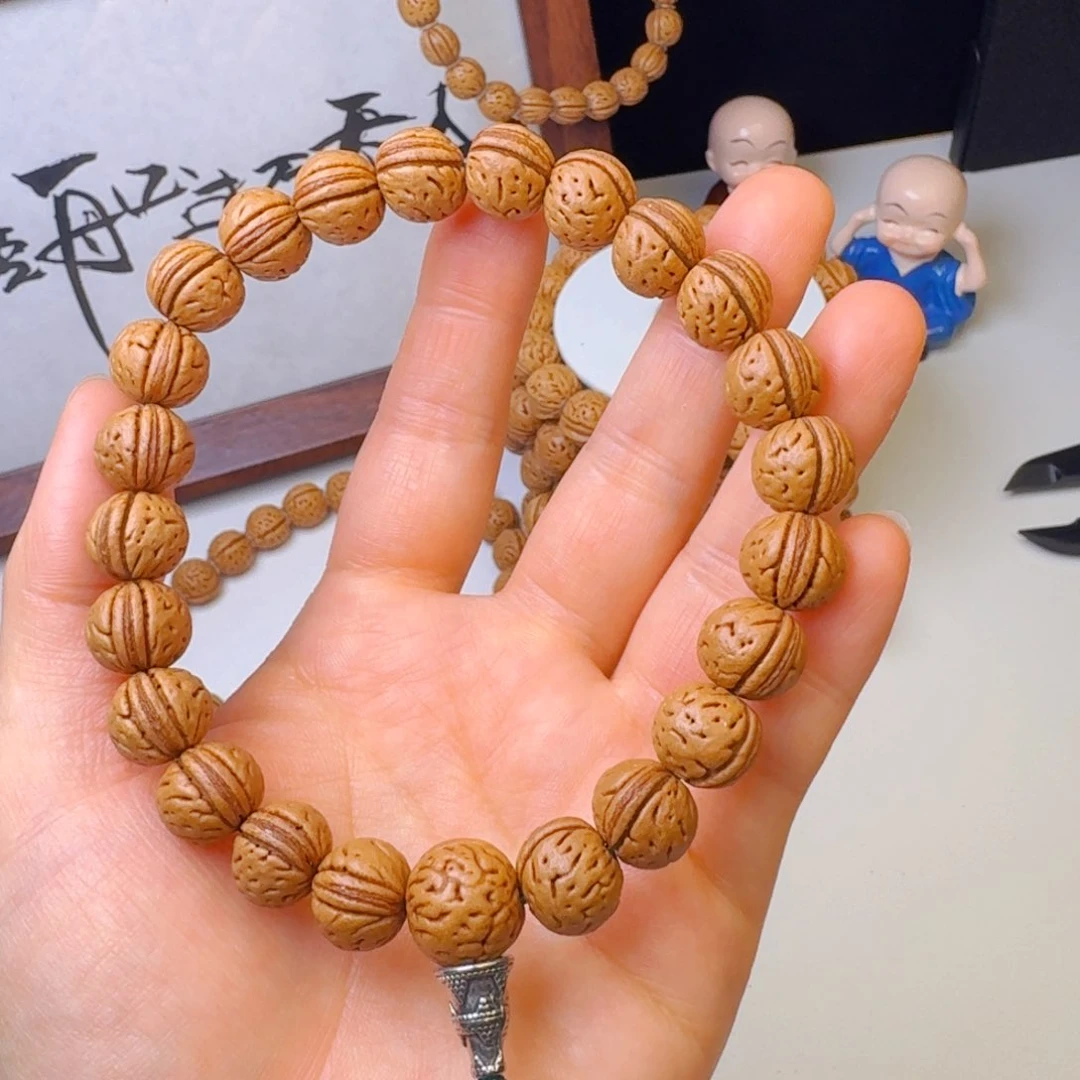 桃核手串12红皮元宝