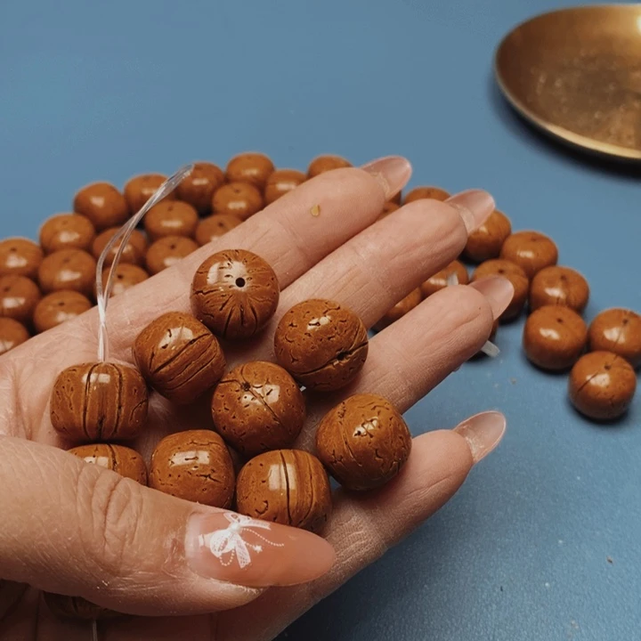 桃核手串老邢16花皮色差15颗