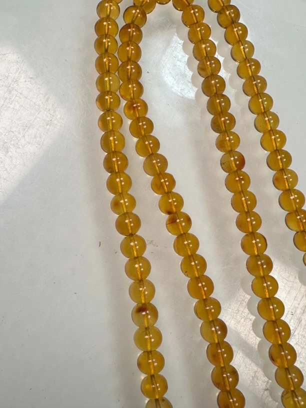 抚顺琥珀金珀7mm108