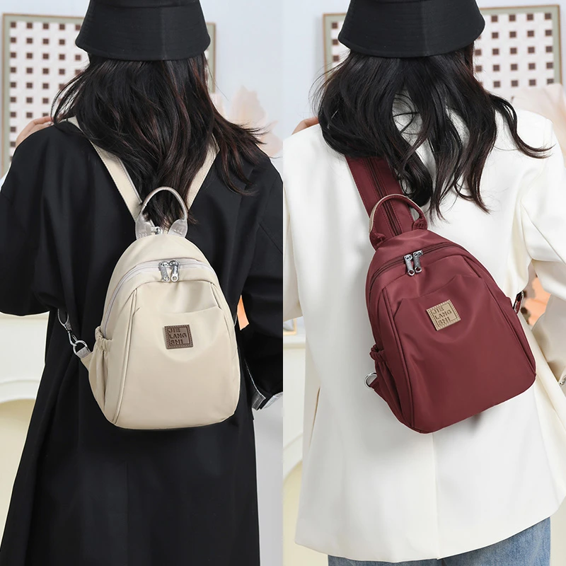 多用双肩包女2025新款牛津布休闲百搭户外旅游通勤小背包斜挎胸包
