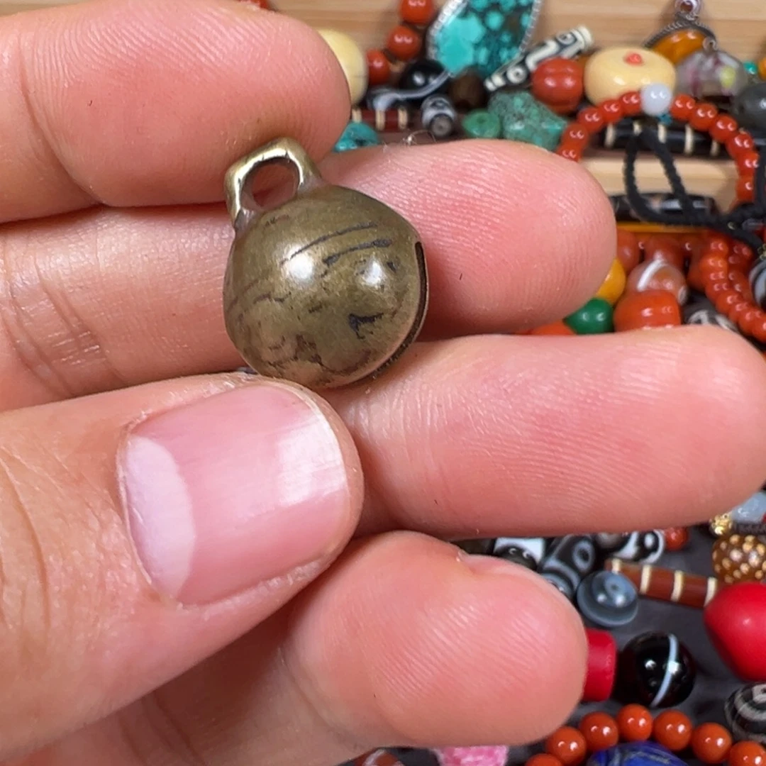 达***家佛心果吊坠手持把件