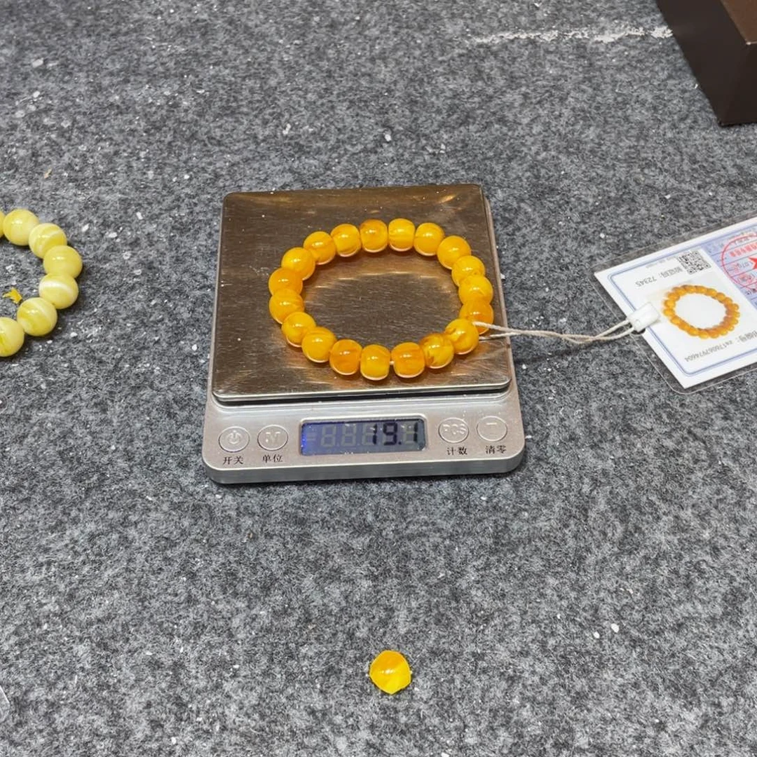琥珀未镶嵌手链老型鸡油黄12毫米