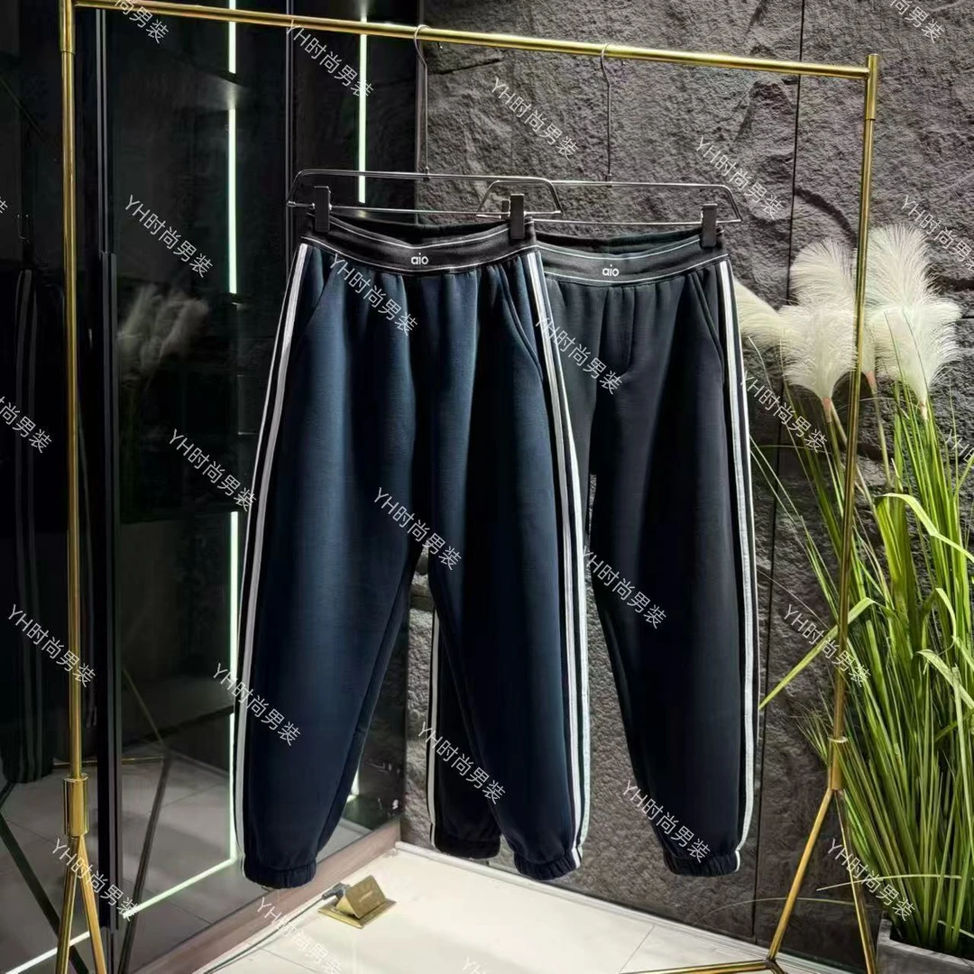 冬季新款时尚潮流美式复古拼接百搭设计感三道杠弯刀束脚休闲裤