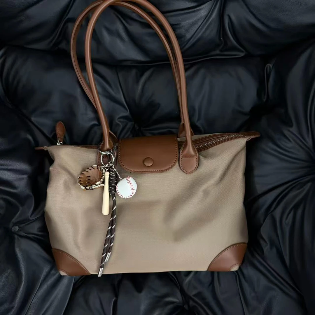 龙虾棒球手拎斜跨女包样品介意勿拍