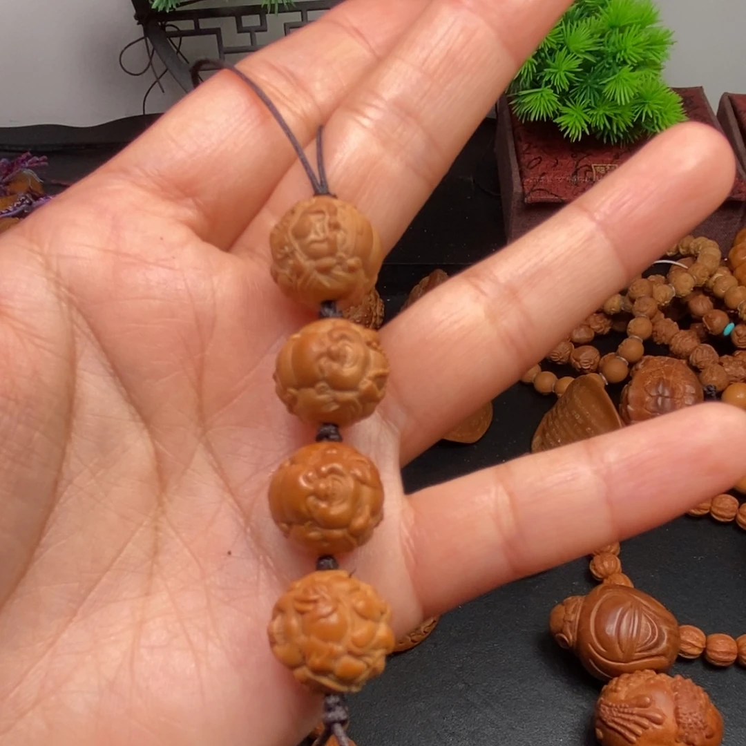 白***笑菩提籽类橄榄核雕刻橄榄核雕刻手串