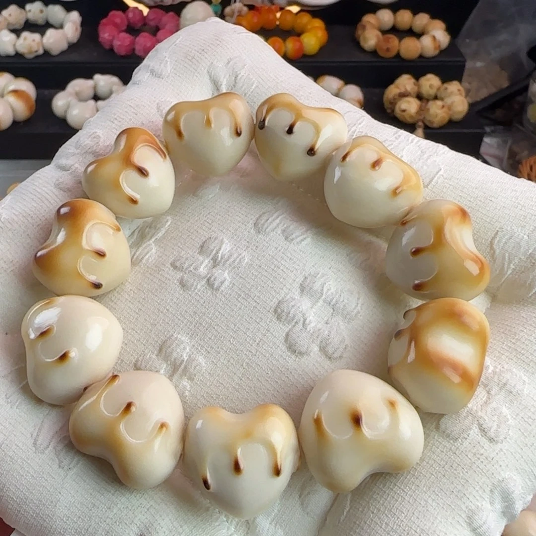 菩提根/象牙果手串微瑕疵黄油爱心炭烤一条手串