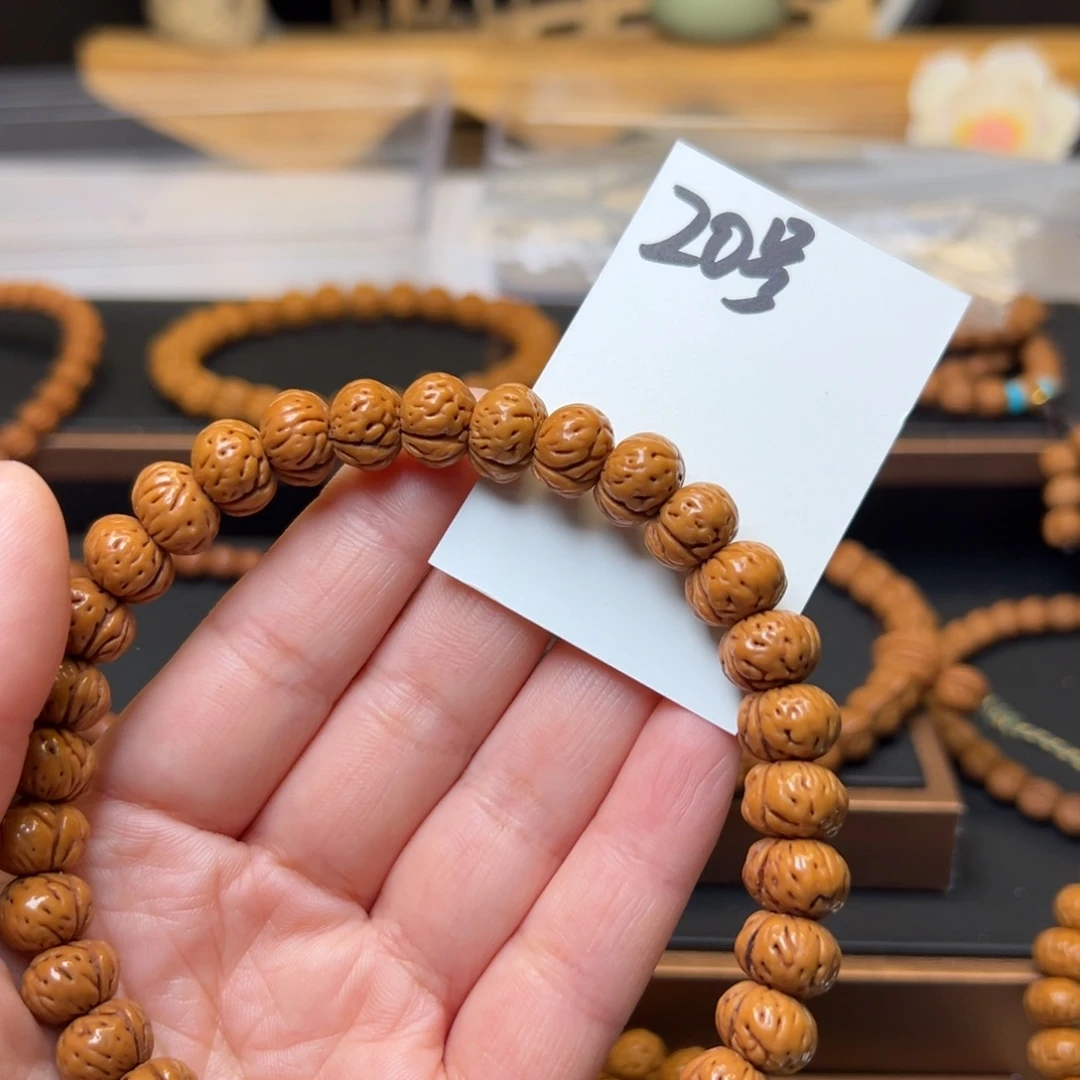 沝***燚文玩核桃把件秦岭龙纹桃核12蟠桃手持