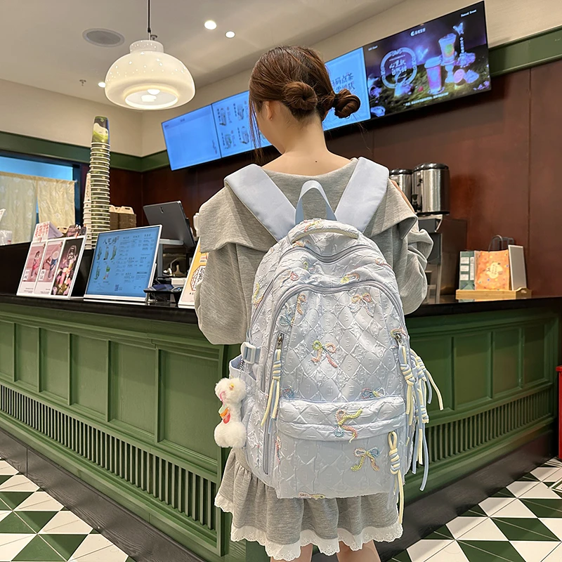 韩版蝴蝶结女双肩包女小众文艺风书包ins高颜值大容量初高中背包
