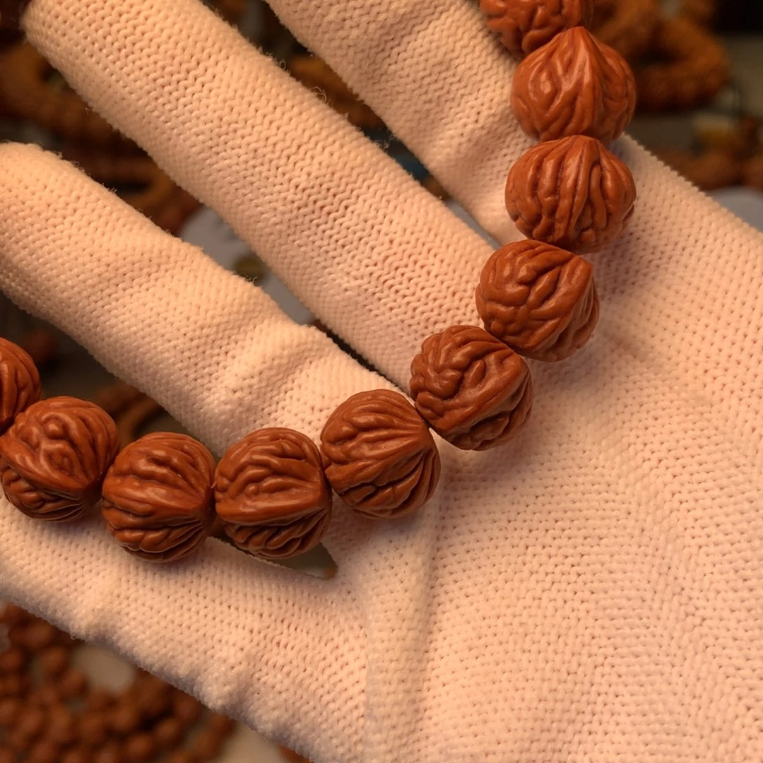 巧***力手串桃核秦岭龙纹