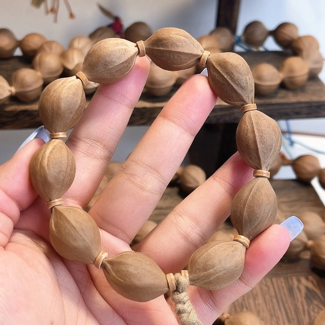 杨***亿橄榄核手串/手链梅林