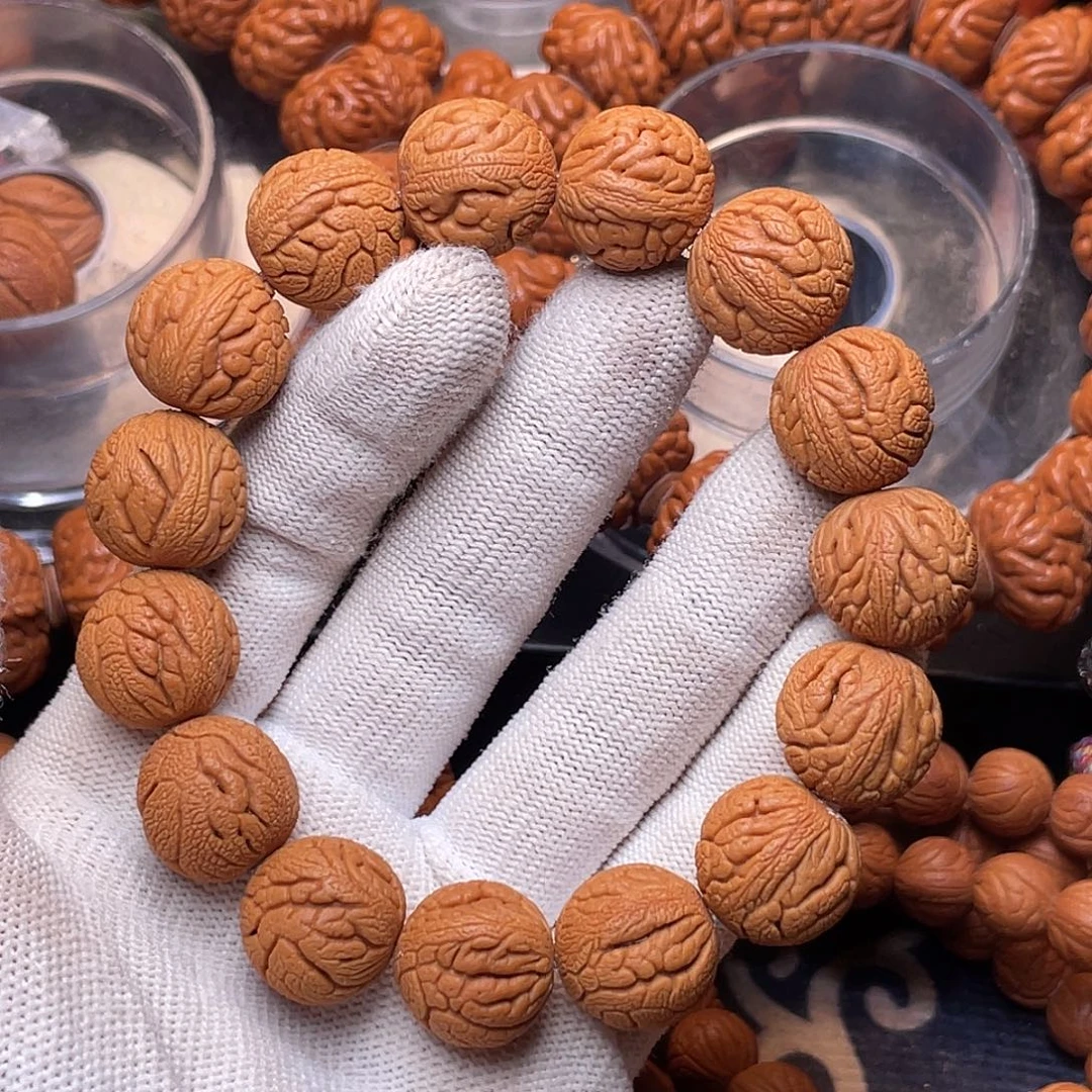 手串桃核金丝龙珠1.7