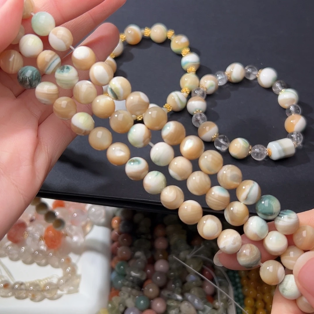 玛瑙/玉髓合金珠宝半成品G560。9.3mm天然夜光螺圆珠一条