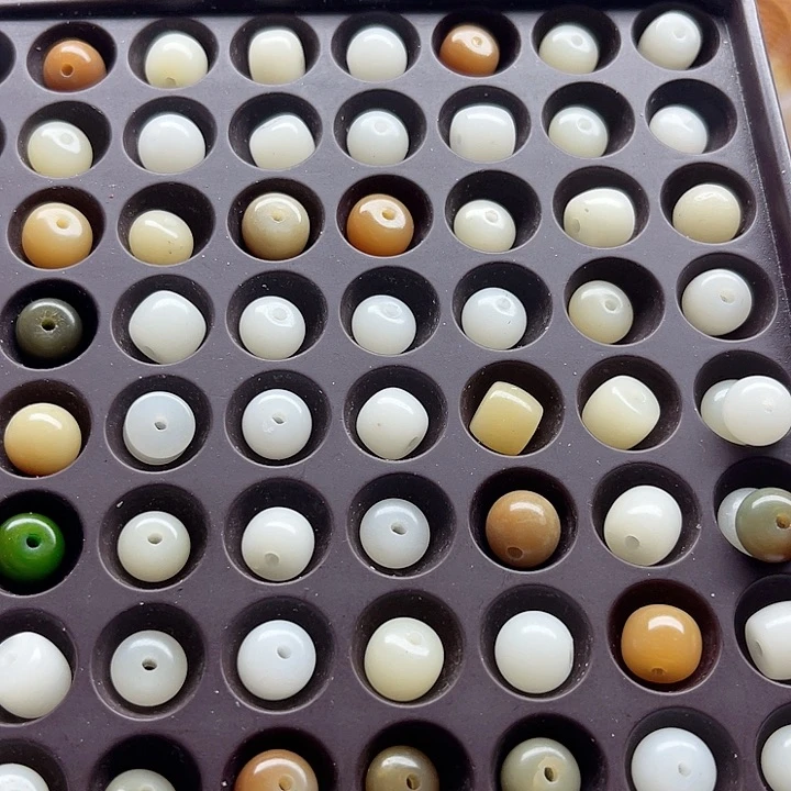 白玉菩提吊坠瑕疵9混珠200卡灯牌宠300