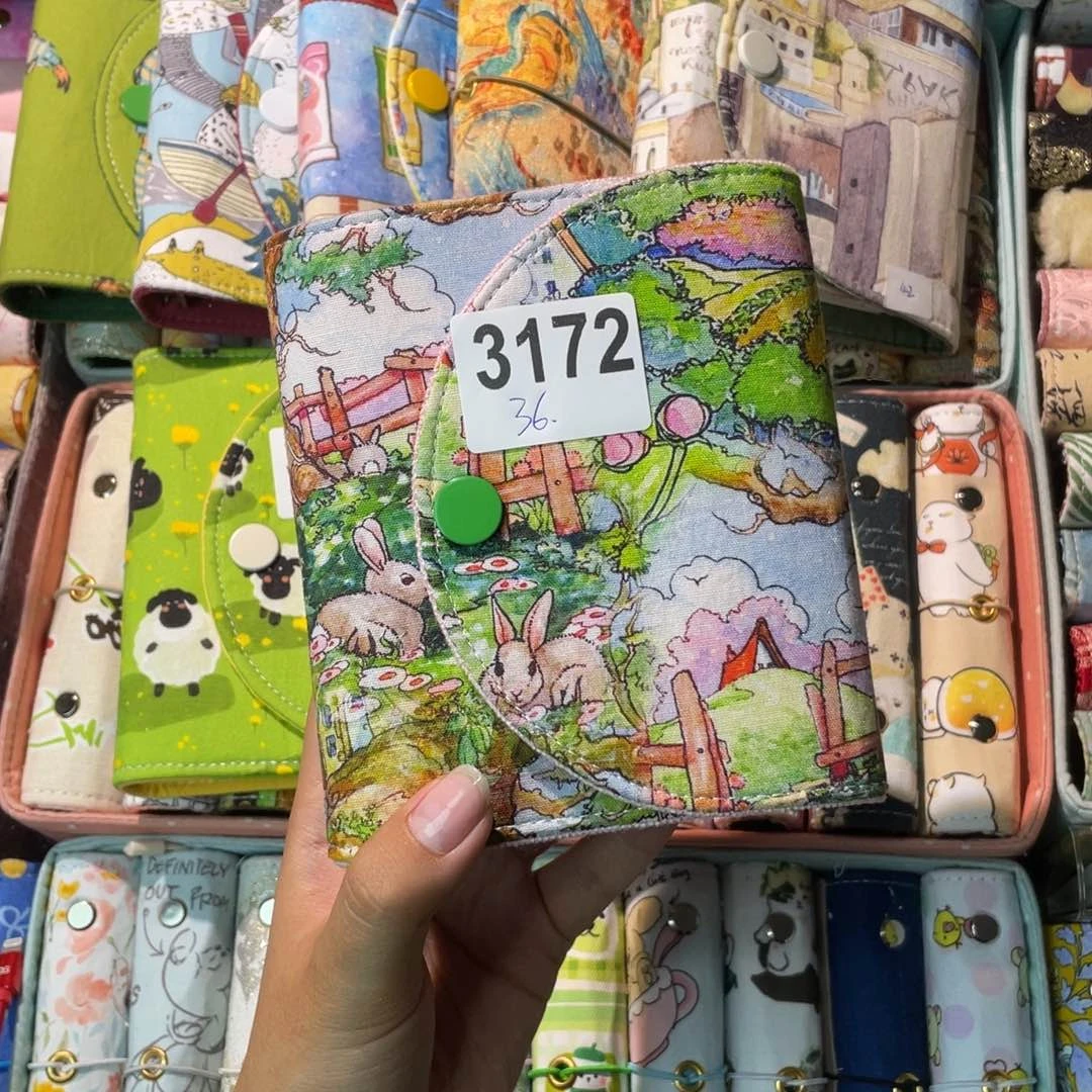 向***葵刺绣a7活页不加纸3172。