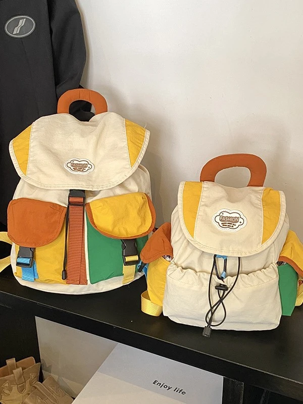 幼儿园小学生儿童书包2025新款时尚撞色男女孩外出游轻便研学背包