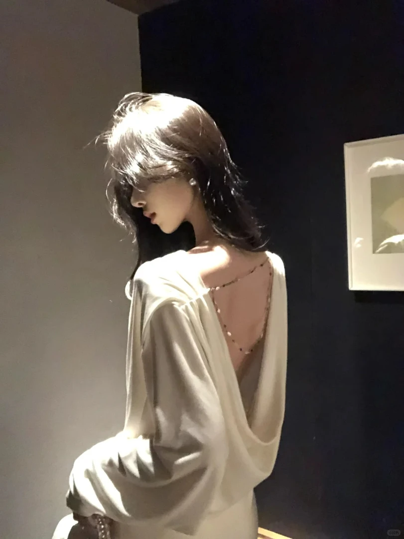 春季新款轻熟风荡领露背独特别致长袖T恤配高腰气质鱼尾半裙套装