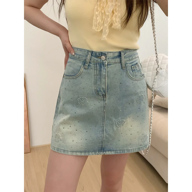 提花烫钻工装牛仔小短裙女夏季薄款显瘦梨形高腰防走光浅蓝a字裙