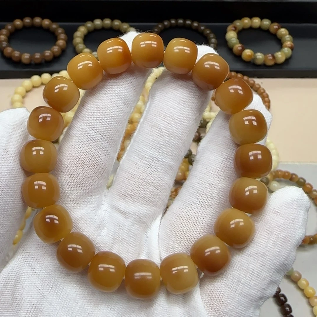 菩提根/象牙果手串11*12 花皮 5年