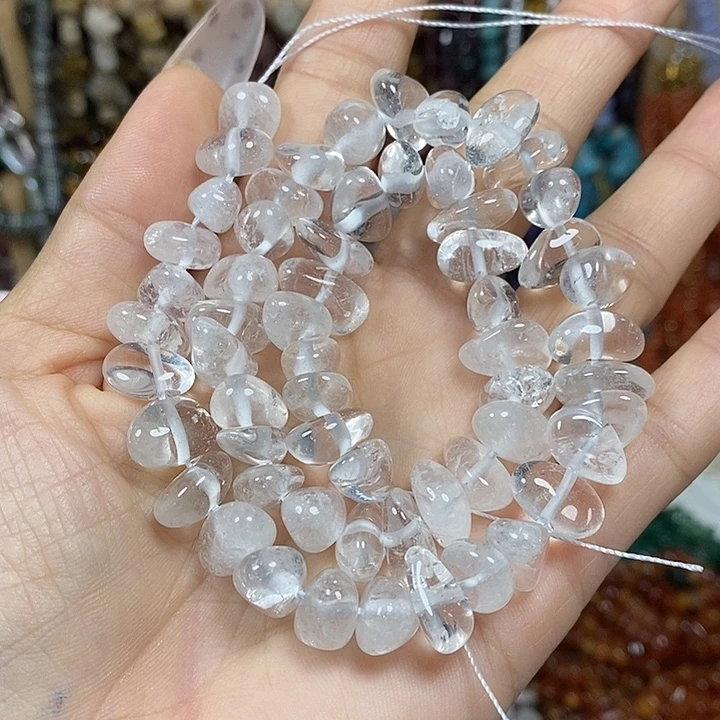 玛瑙/玉髓未镶嵌珠宝半成品天然白水晶糖豆一条