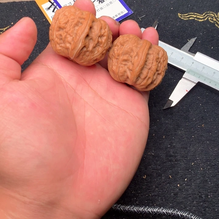 文玩核桃把件53号41元宝